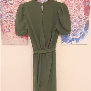 Green Jumpsuit with open back.